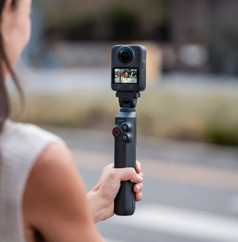 Compact 4K Action Camera with 360° Capture, HD Video Recording, Touchscreen & Handheld Grip for Travel and Adventure